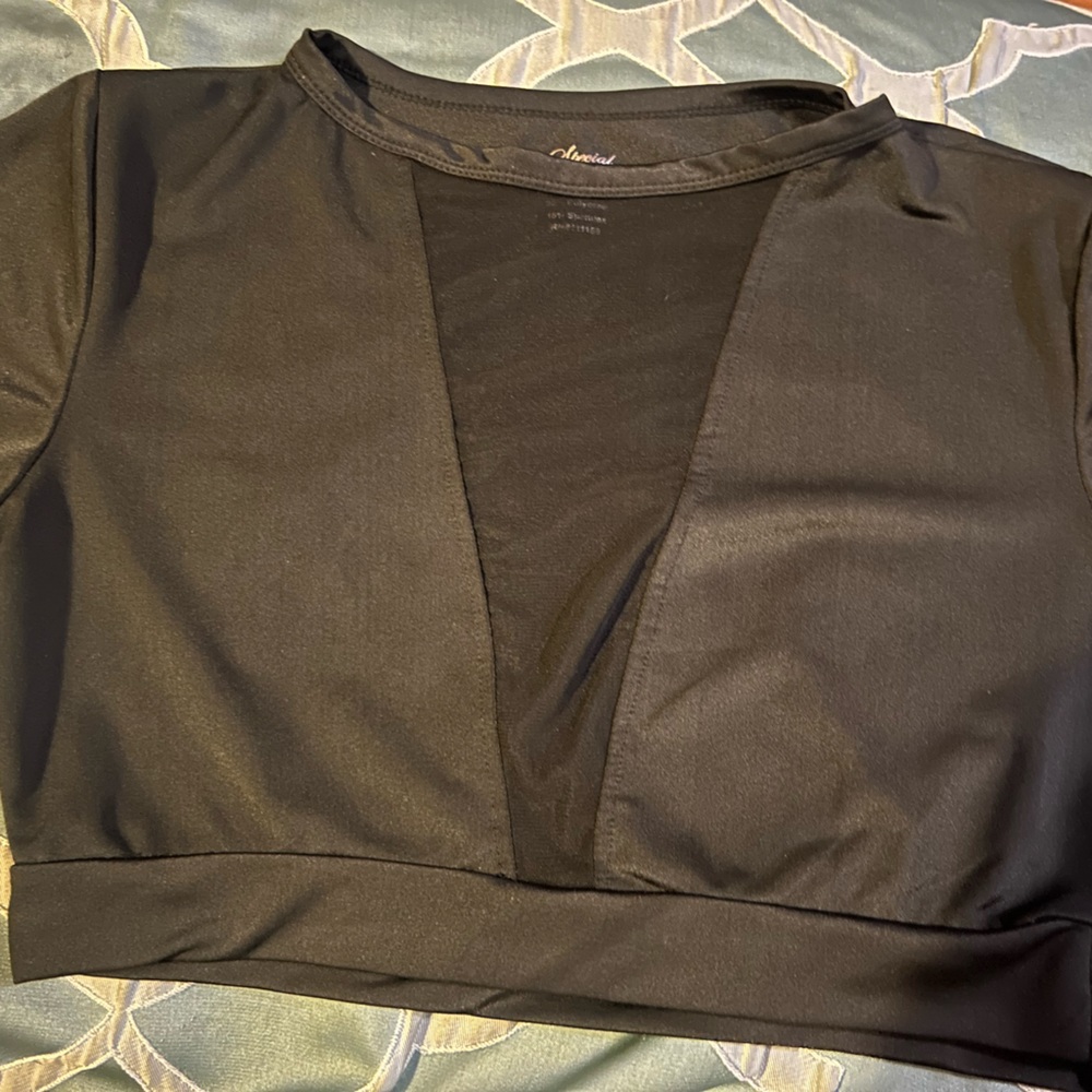 black crop top w/ a see through cut